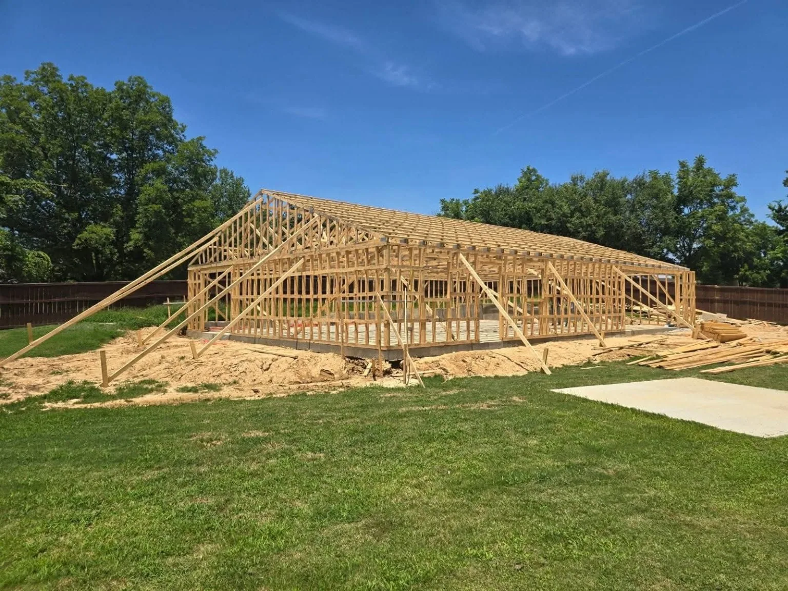Wood framing and roof trusses under construction