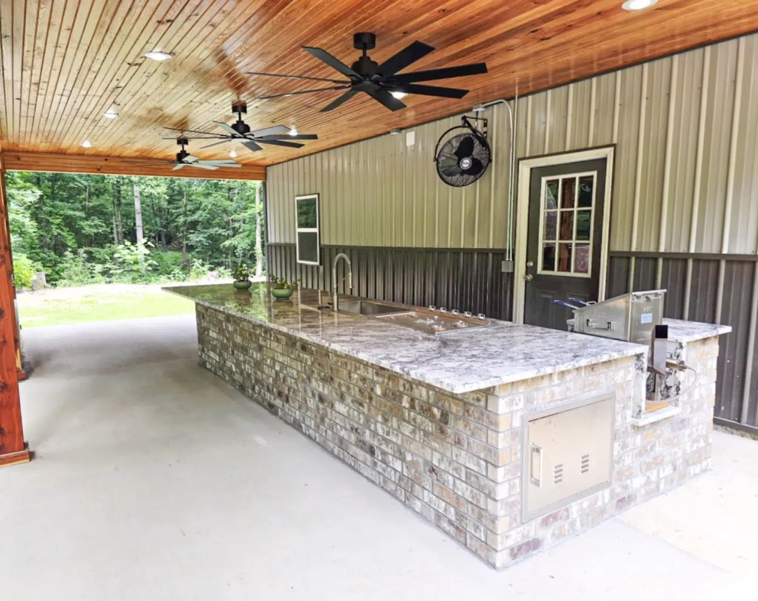 Granite countertop and sink at outdoor kitchen