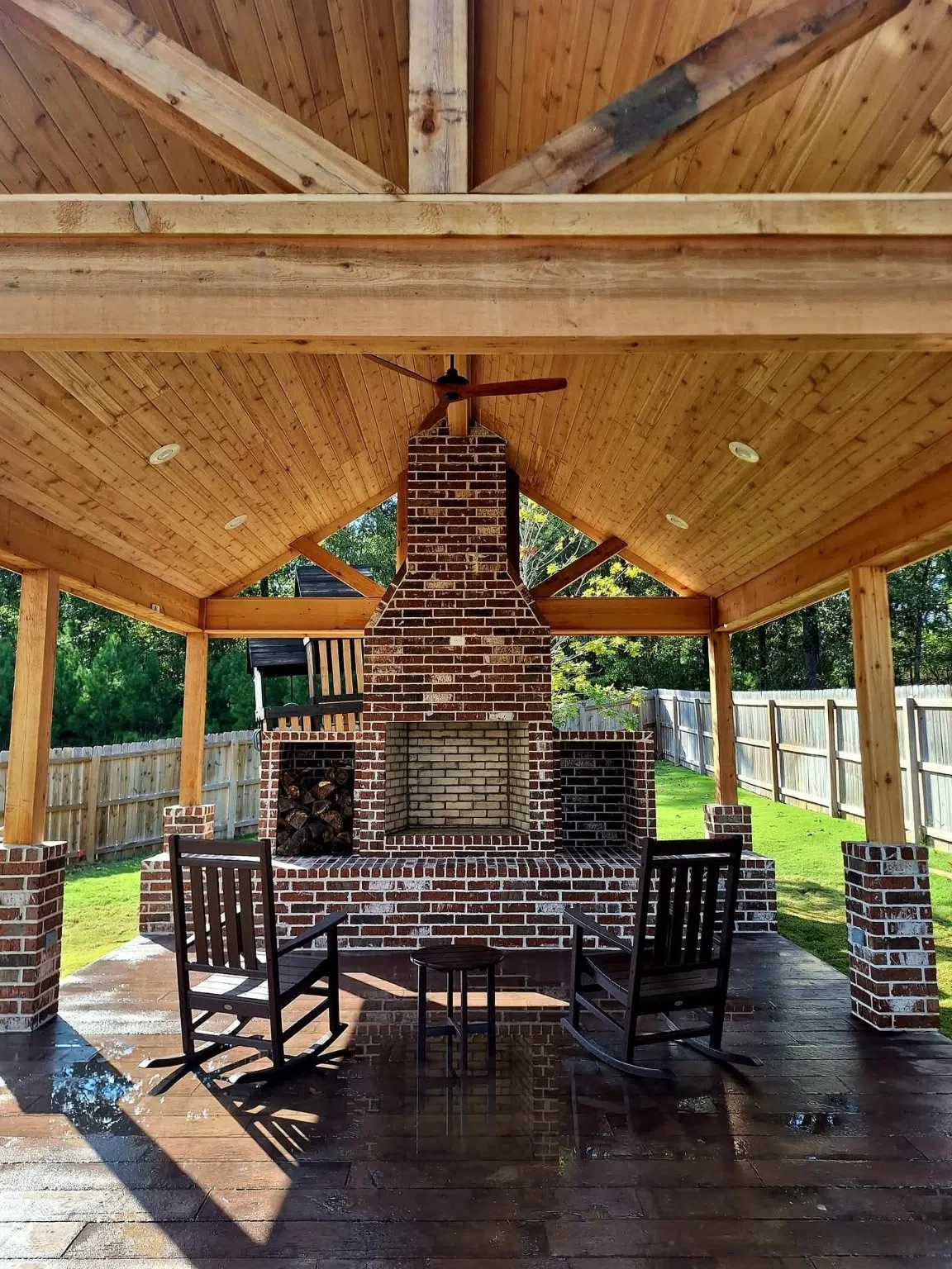 Inside view of pavilion with wood ceilings and fireplace